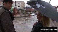 A German whore catches a customer on a rainy day