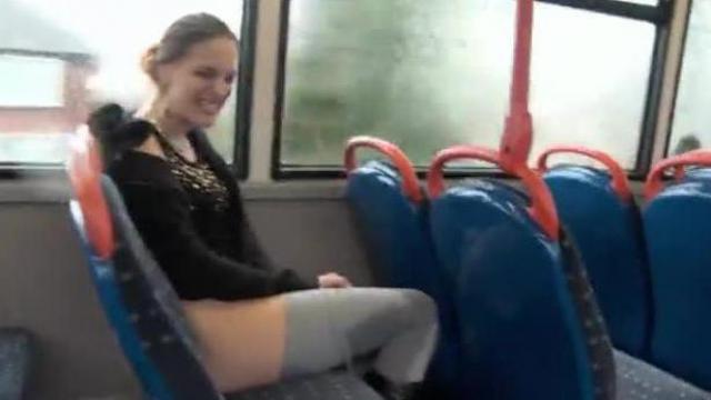A horny schoolgirl shows off her body on the bus